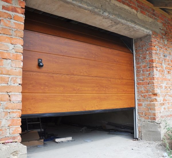 Lubricating garage door tracks