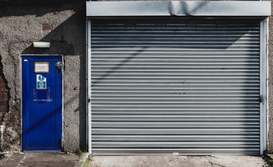 rolling fire door inspector assessing