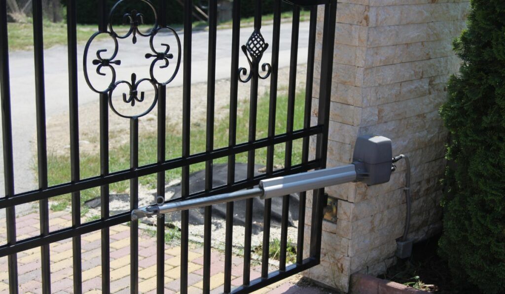 Person pressing remote but gate not opening