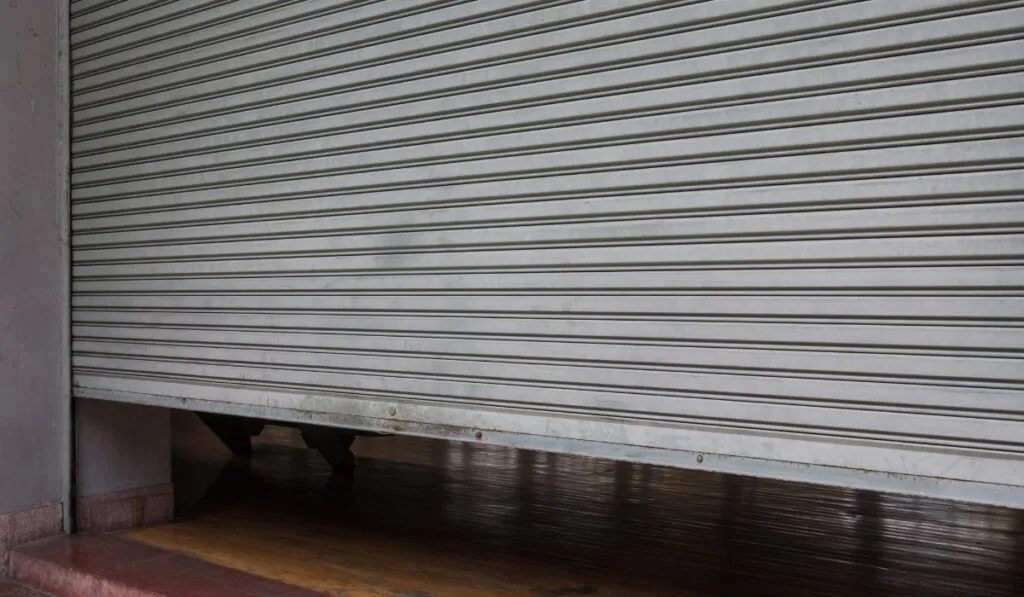 sectional door vs rolling steel benefits