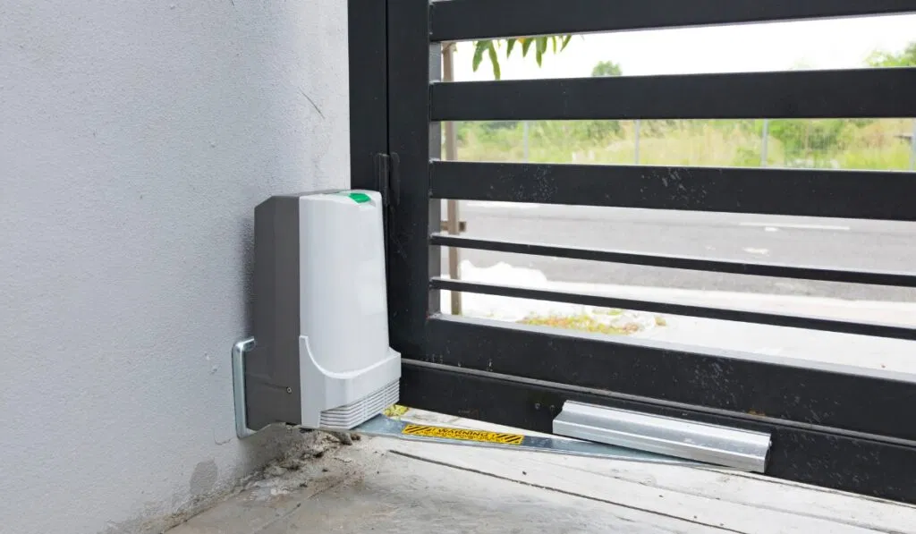 Cleaning automatic sliding gate track for proper movement