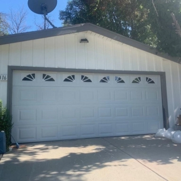 Garage door safety checkup ensures secure operation and reliability for homeowners in residential area