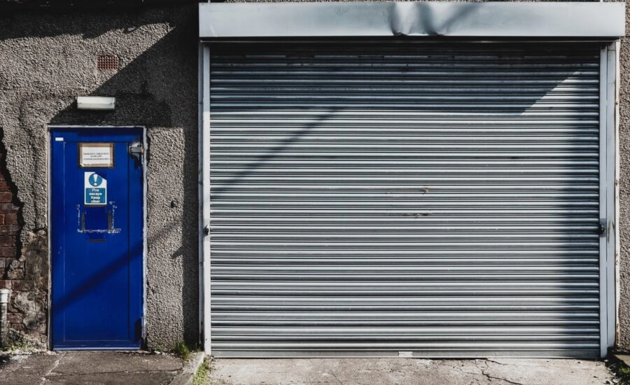 rolling fire door inspector assessing